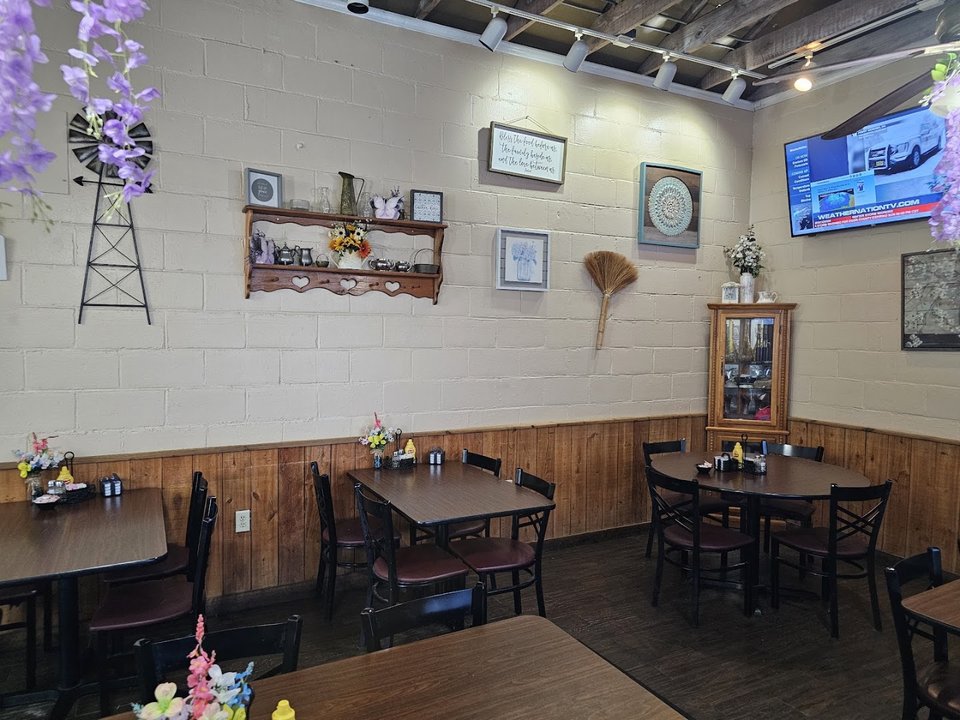 Simple dining room with booth seating.